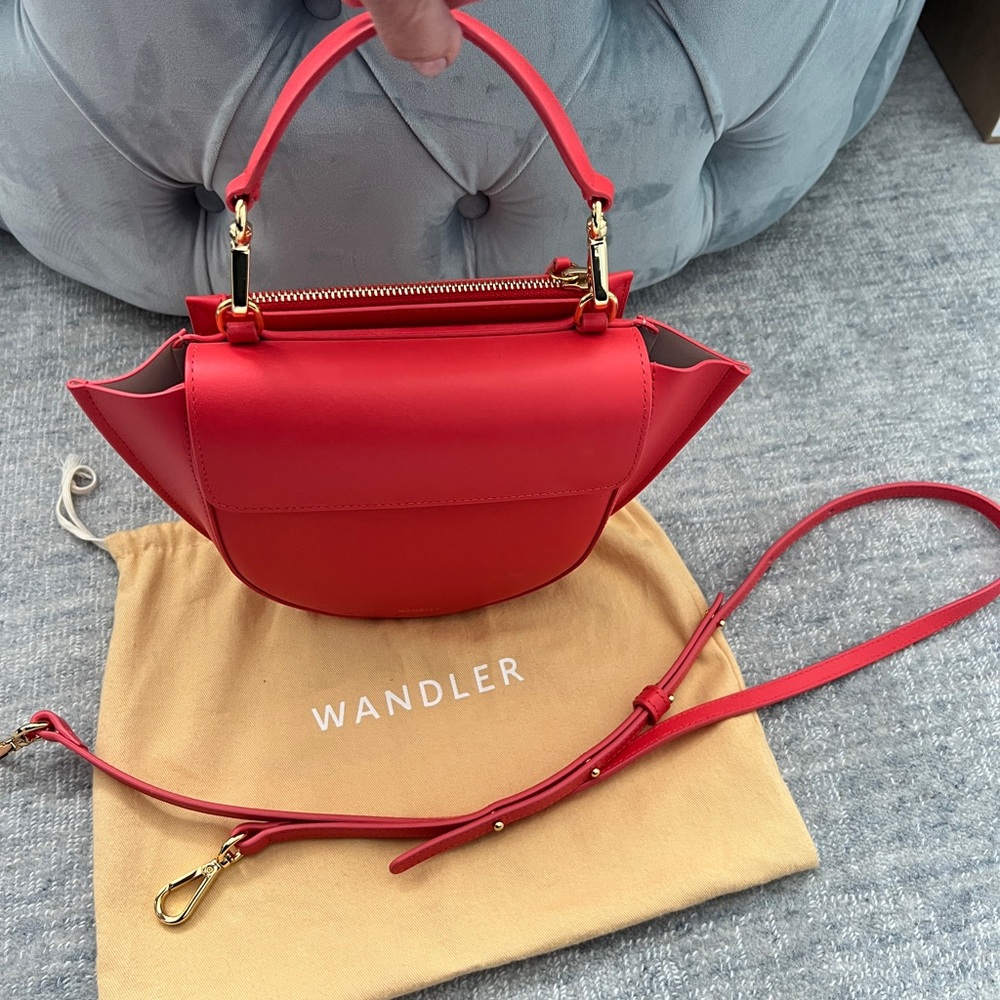 Wandler classic moon shaped handbag in bright poppy red.
